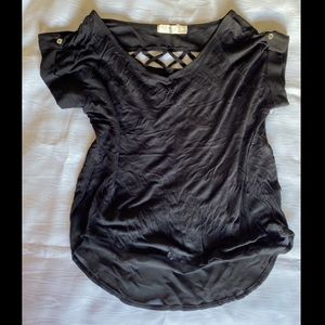 Black top with detailed and sheer back